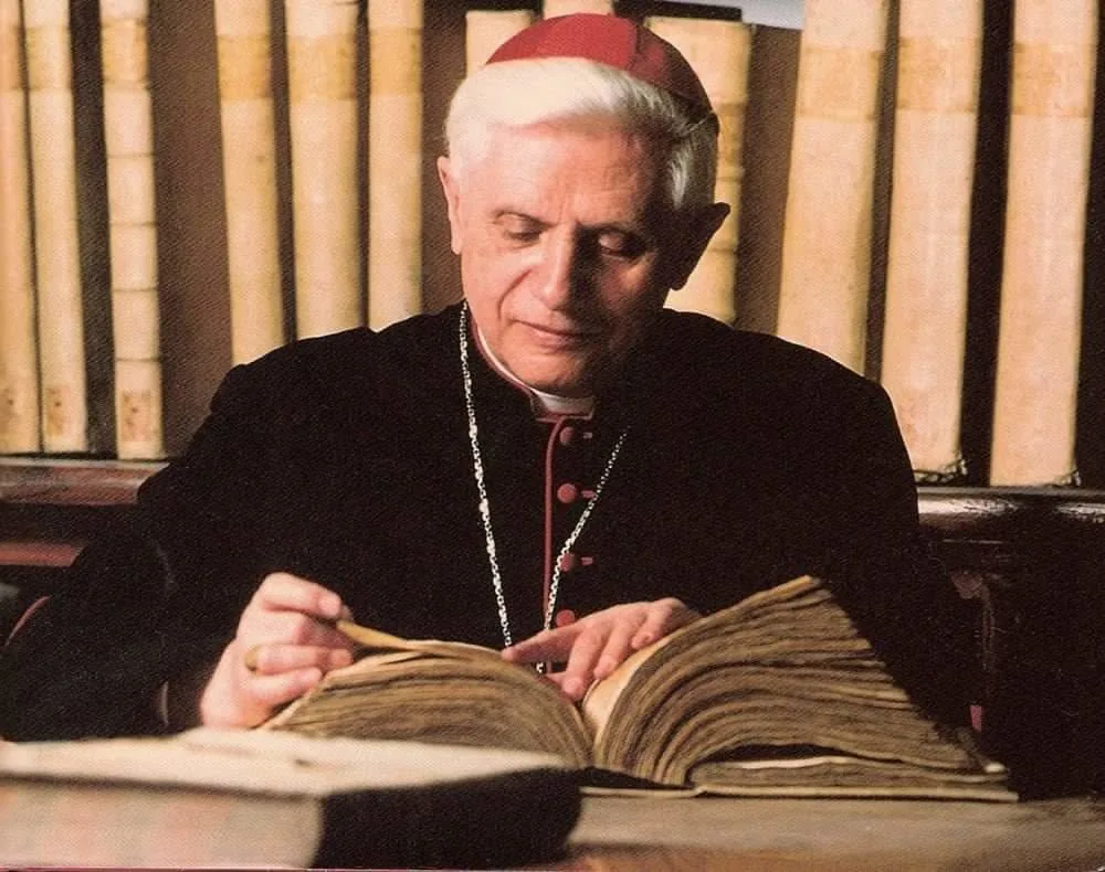 Joseph Ratzinger studying a historic book