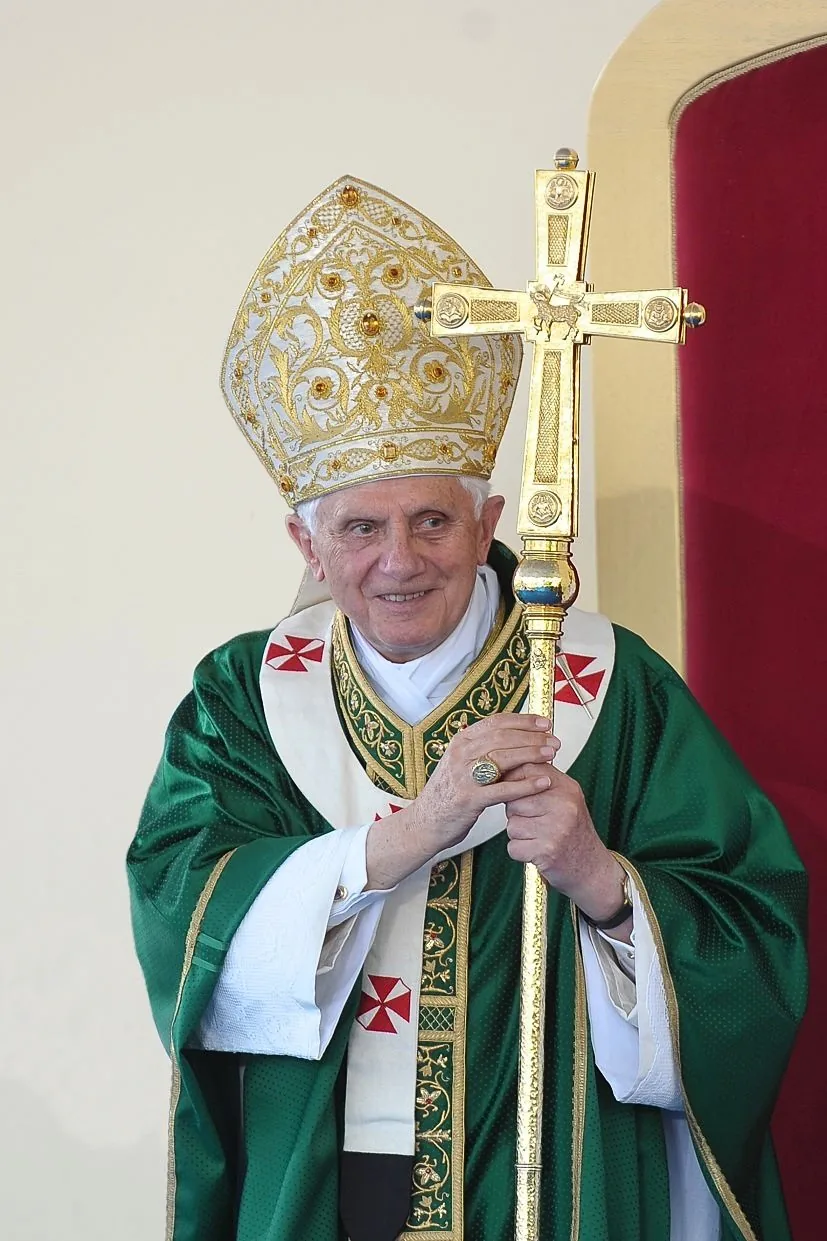 Pope Benedict XVI in green vestments holding a processional cross