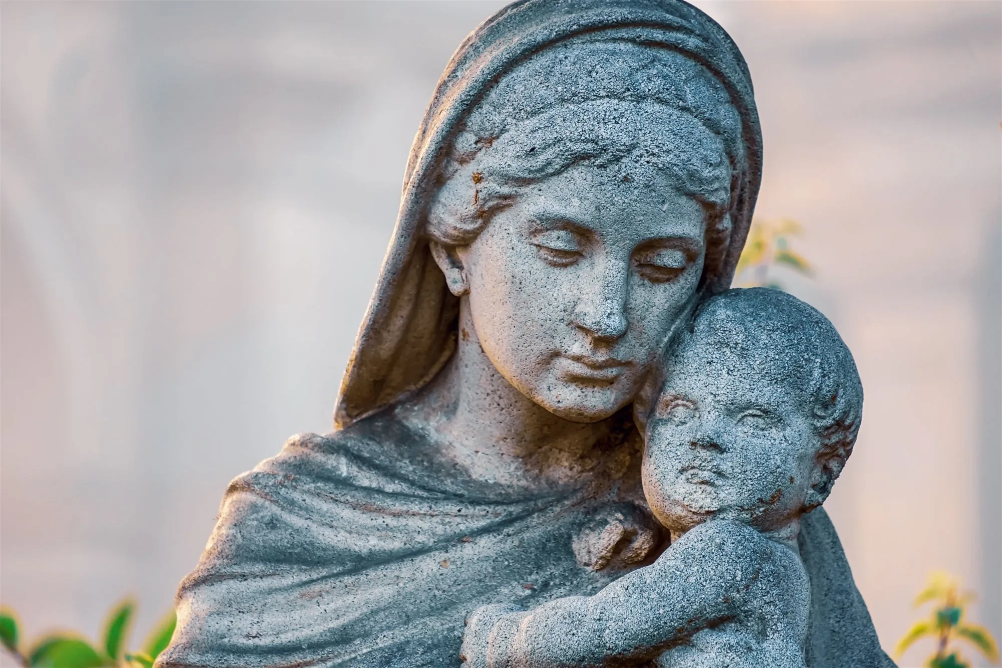 Stone statue of the Virgin Mary holding the Christ Child